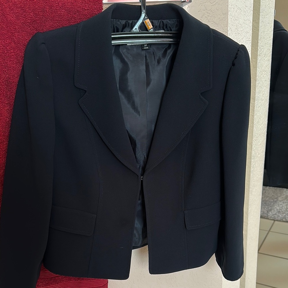Elegant dark navy woman’s suit jacket